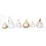 Six Royal Crown Derby paperweights including: Mother Rabbit (silver stopper), Snowy Rabbit (gold