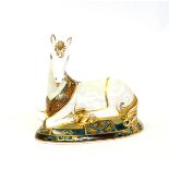 A Royal Crown Derby paperweight, Unicorn (835/2000 with gold stopper)In good structural condition,