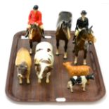 A group of Beswick comprising huntsman, hunt lady, bay hunter, two cattle and two calves