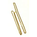 A 9ct gold rope necklace and three row bracelet