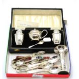 A cased silver three piece cruet set, a silver bud vase, a set of twelve teaspoons and two sets of