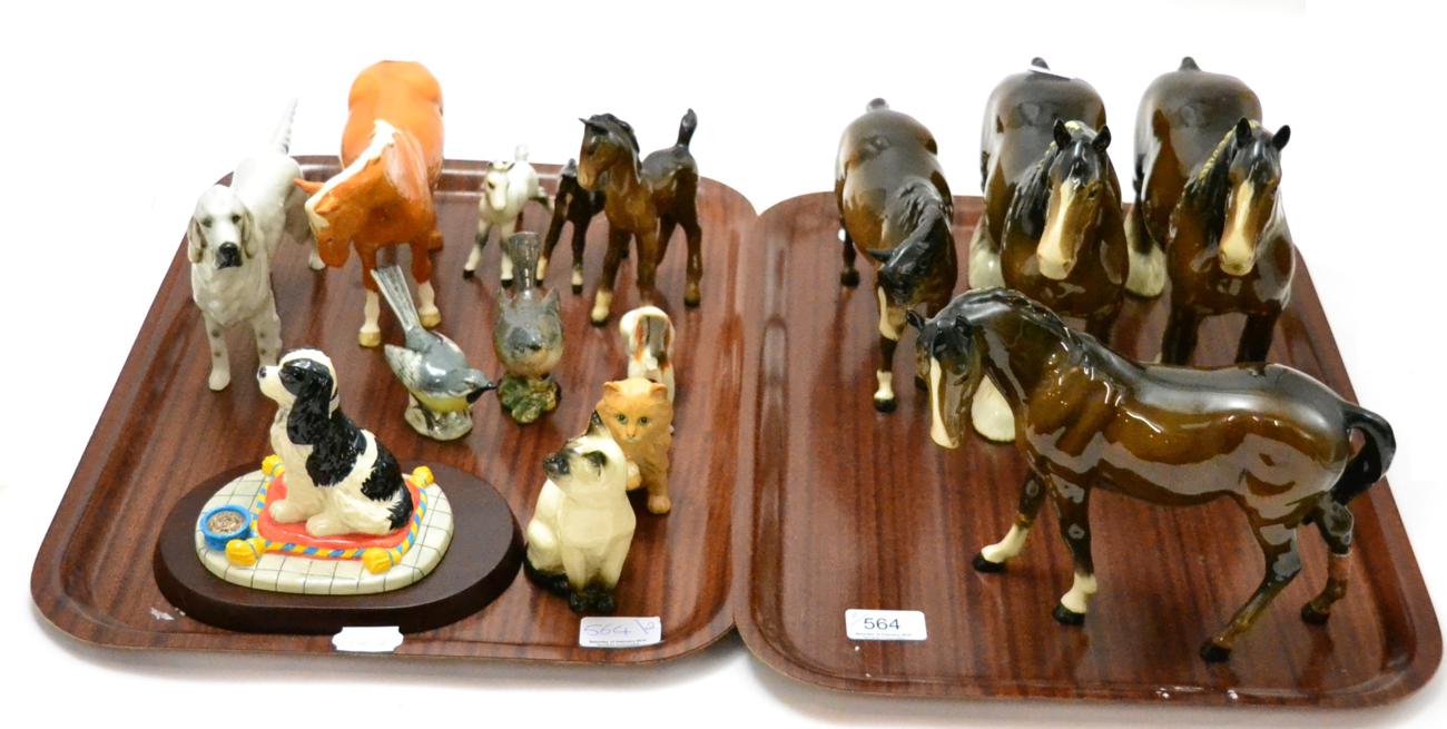 A collection of Beswick animals including two bay shires, palamino pony, foals etc together with