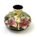 A modern Moorcroft Lilies of the Field pattern 32/5 vase, designed by Rachel Bishop (boxed)