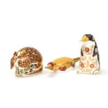 Three Royal Crown Derby paperweights including: Armadillo, Duck Billed Platypus and Platypus (each