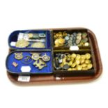 A quantity of buttons and badges including silver, enamel and ebony hunt related buttons and