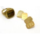 A 9ct gold tiger's eye ring and a pair of 9ct gold cufflinks bearing initials