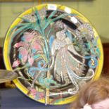 A Furnivals faience pottery dish decorated with an exotic bird amongst foliage