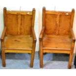 Two pitch pine armchairs