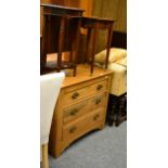 A three height chest of drawers, two occasional tables, nest of three oak tables, quantity of