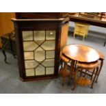 Georgian mahogany glazed corner cupboard, a reproduction nest of tables and a sewing box