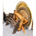 Four Eastern folding stands with brass, copper and decorative tray tops