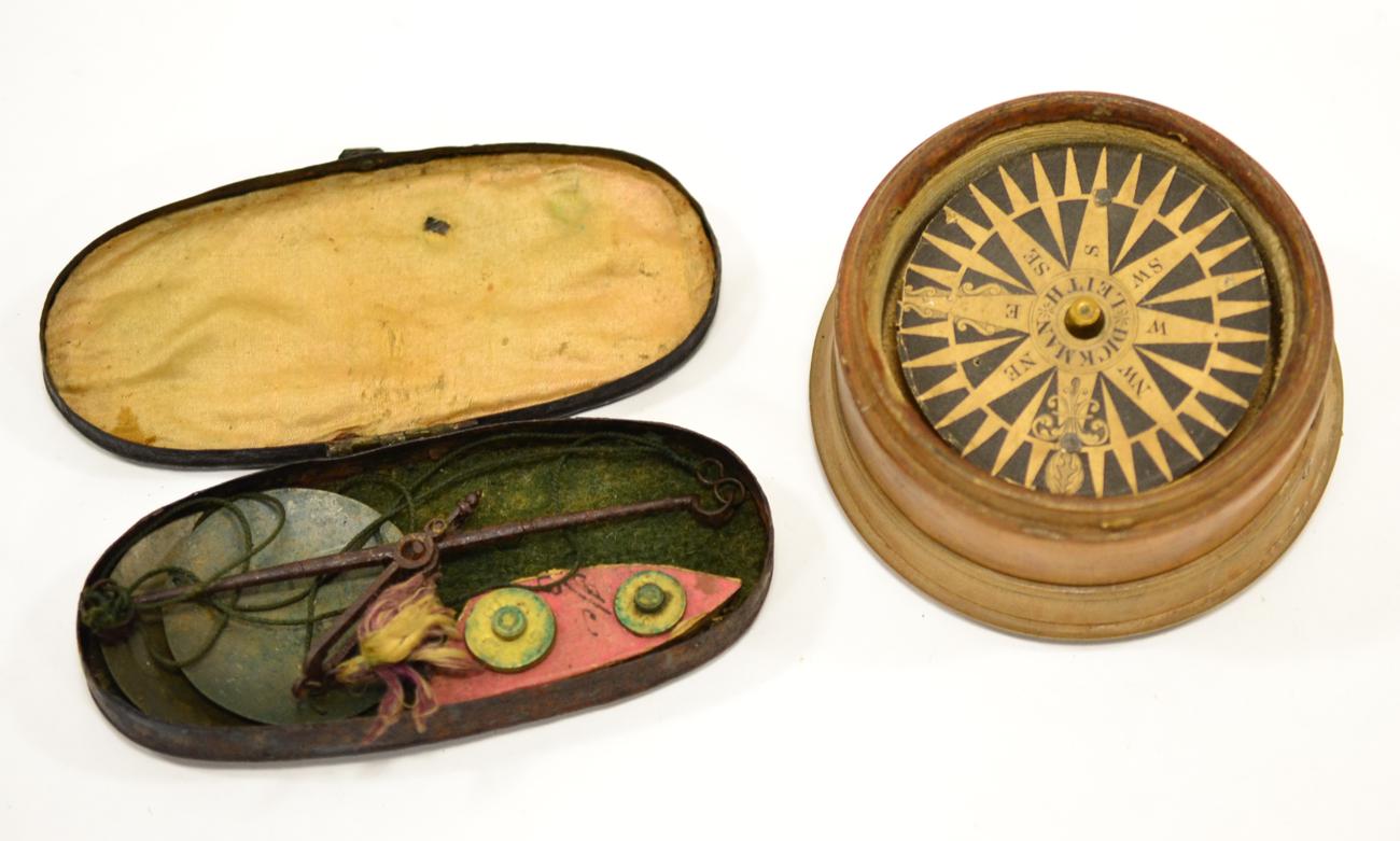 Opium Scales with circular brass pans in metal case, together with a Dickman (Leith) Dry Compass