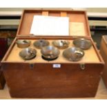 Handbells fifteen hand bells with leather fittings in two layer wooden case and two