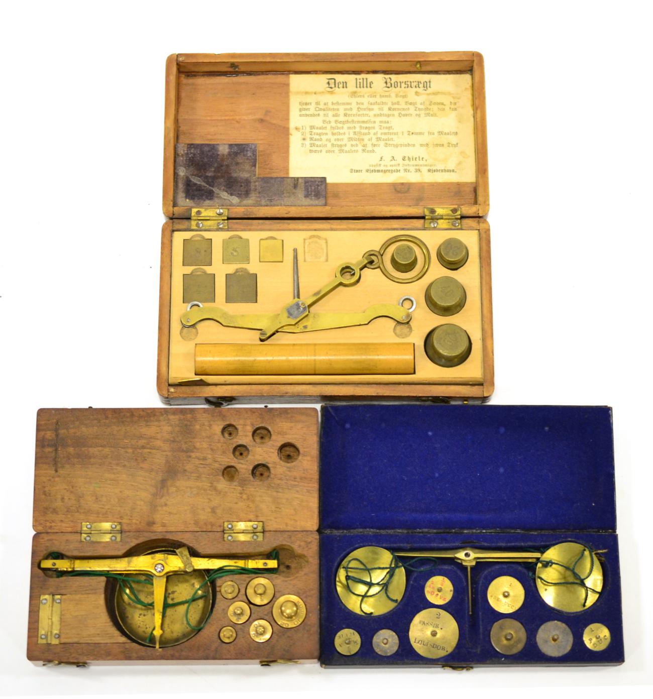 Continental Hand Scale And Weights Sets Den Lille Borsvaegt and two similar sets all in wooden cases