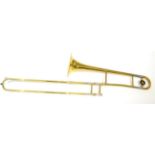 A Brass Trombone by Arbiter Pro Sound, in a plush lined case