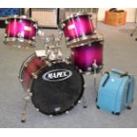 A Mapex Saturn Series Drum Kit, with electric berry burst finish