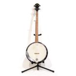 A Saga 5-String Banjo, with a 29cm head, mahogany resonator and neck, in a plush lined case, with