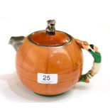 A Plymouth Argyle Novelty Football Teapot, the body as a ball, with player for handle, F.A. Cup
