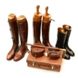 Three Pairs of Leather Riding Boots, comprising a pair of black leather size 8 Sanders 3/4 riding