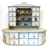 Mid 20th Century White Painted Shop Counter, with blue painted trims, and eighteen labelled