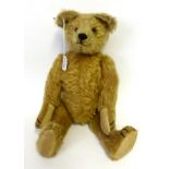 Circa 1930s Yellow Plush Jointed Teddy Bear, with small hump to the reverse, growler, cotton pads,