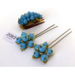 Pair of Decorative Faux Turquoise Hair Combs, of floral design with gilt metal petals, 12cm by