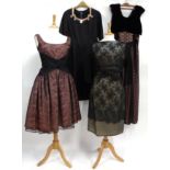 Four Circa 1940s to 1960s Dresses, including a black satin cocktail dress, three quarter length
