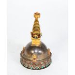 A small Eastern white metal and gilt turquoise and coral set ornament