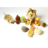 Berg miniature seated tiger and duck, three miniature Steiff wool birds, Schuco miniature rabbit,