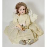 Wagner & Zetzsche 10586 bisque socket head character doll, with sleeping brown eyes, open mouth,