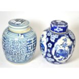 Two Chinese blue and white porcelain jars and covers circa 1910 The darker of the two with slight