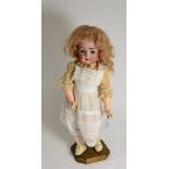 A German Kammer & Reinhardt, Simon & Halbig bisque socket head child doll, impressed '403', with