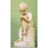 A 19th century carved alabaster figure of a naked young boy