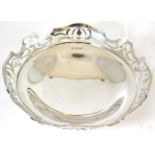 A silver footed dish with pierced rim, marked for Sheffield