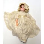 A German Armand Marseille bisque socket head doll, impressed '1894' '6', with blonde wig, sleeping