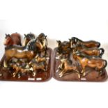 A collection of brown Beswick horses and foals (on two trays)