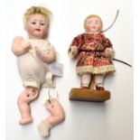 A German Hertel Schwab & Co character bisque socket head doll, impressed '150' '1/0', with