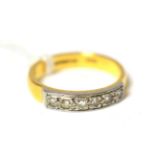 A 22ct gold six stone diamond ring