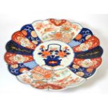 Japanese Imari charger 47cm wide. One small hairline approx 4cm from rim. Other hairline cracks
