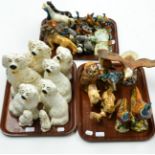 A collection of Beswick animals including birds, deer, horses, a lion etc, together with three pairs