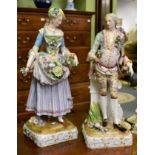 A pair of 19th century Meissen style porcelain figures of a lady and gentleman in 18th century