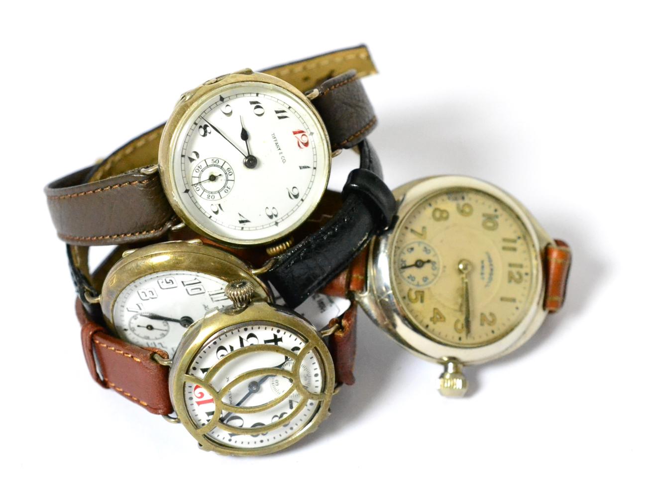 Four enamel dialled wristwatches, singed Tho Russell, Tiffany & Co, Waltham and Ingersoll