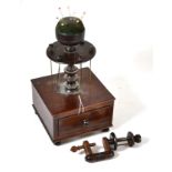 A 19th century mahogany bobbin stand with pin cushion top and single drawer below, and a rosewood