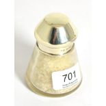 A silver topped smelling salts jar