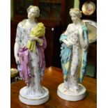 A pair of 19th century Meissen style porcelain figures of two ladies in 18th century costume 32cm