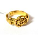An 18ct gold knot ring