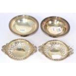 A pair of silver dishes with bow decoration and a pair of silver footed dishes 11 ozt