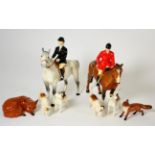 Beswick Hunting Group Comprising: Huntsman, model No. 1501, style two, brown gloss, Huntswoman,