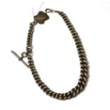 A substantial silver watch chain and fob with ''T'' bar