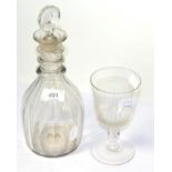 A Regency triple ring neck mallet decanter and bullseye stopper and a baluster stem goblet